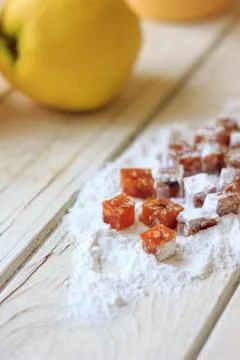 Qunce paste on sugar powder Stock Photos