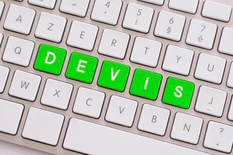 Quotation in green on white keyboard Stock Photos