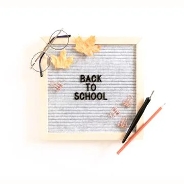 Quote Back to school. Autumn composition with letterboard Stock Photos