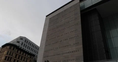 A quote from the First Amendment on the entrance of the Newseum in Washington DC Stock Footage