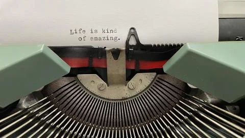 Quote on green typwriter Stock Photos