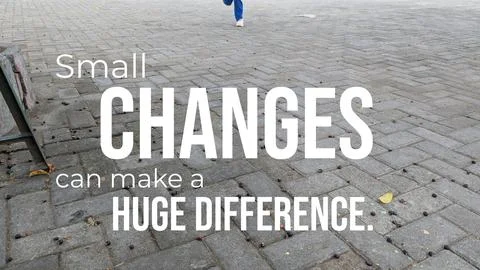 Quote "Small CHANGES can make a HUGE DIFFERENCE" is on a photo of gray bric.. Stock Photos
