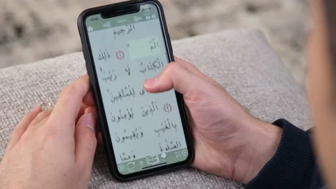 Quran mobile phone Stock Footage 233398233