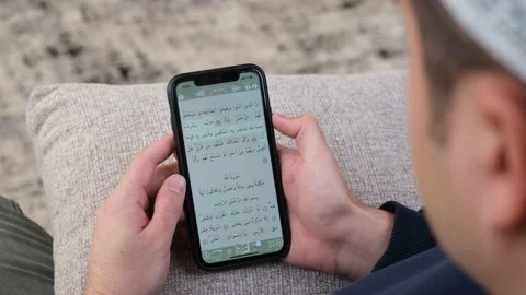Quran mobile phone Stock Footage 233398301