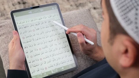 Quran Muslim tablet Stock Footage 233399731