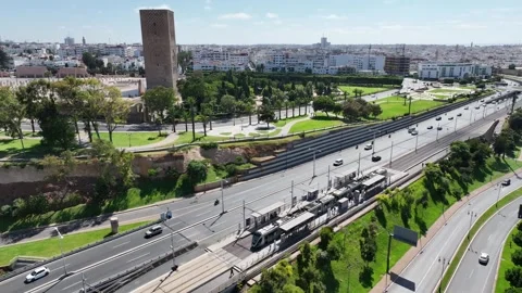 Rabat Tramway Passing Hassan Tower in Modern Moroccan Capital Stock Footage 346906272