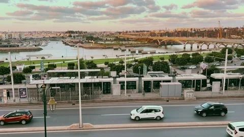 Rabat–Salé Tramway by the Bouregreg River at Sunset, Morocco Stock Footage 303966720