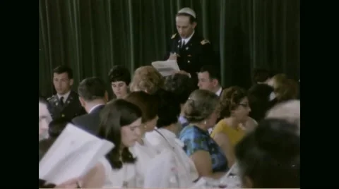 Rabbi talking to congregation during Passover festival Stock Footage 44573161