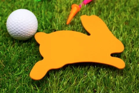 Rabbit and golf ball for Easter holiday 스톡 사진