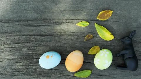 Rabbit decoration and Easter eggs on wood backgrounds above. Place for your.. Stock Photos