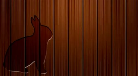 Rabbit shape carved on a rusty piece of Wood. Illustrazione stock