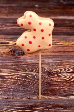 Rabbit shaped biscuit on stick. Stock Photos