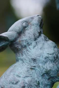 Rabbit Statue on Pan Statue in the Rose Garden of Sheffield Botanical Gardens Stock Photos