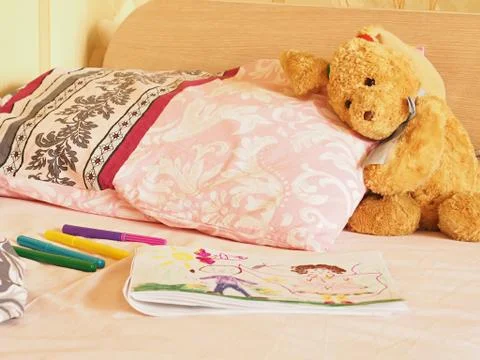 Rabbit toy on the bed Stock Photos