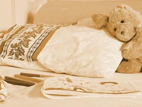 Rabbit toy on the bed Stock Photos