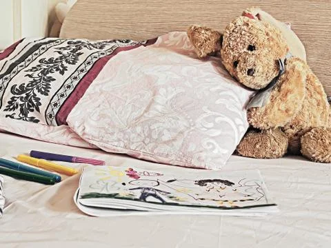 Rabbit toy on the bed Stock Photos