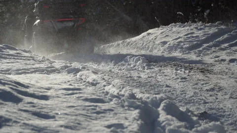 Race on ATVs Through the Snowy Forest. Stock Footage 170678464