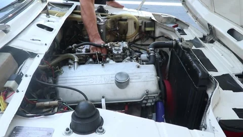 Race car Bmw engine close up with origin... | Stock Video | Pond5