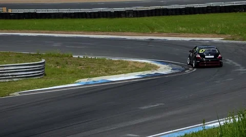 Race car cornering Stock Footage 54991472