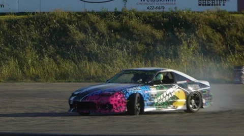 Race car drifts around corners in slow motion Stock Footage 59747090