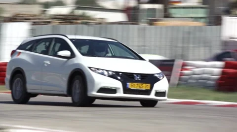 Race car driver drives car on track Stock Footage 41264784