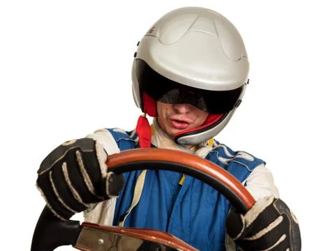 Race car driver in the helmet while driving. On a white background Stock Photos