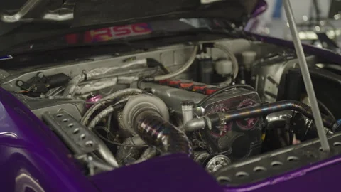 Race car engine under the hood camera dolly zoom-in 4K Stock Footage 315153996