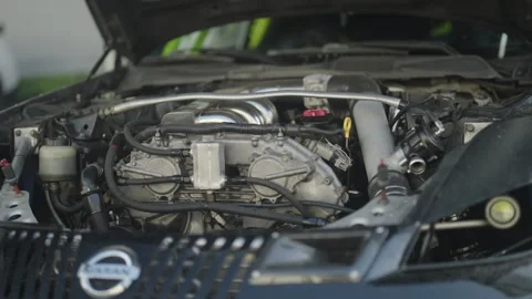 Race car engine under the hood camera dolly slide 4K Stock Footage 315154036