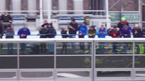 Race Car Moving Slow Motion, Crowd on Stands Looks Stockbeeldmateriaal 83085162