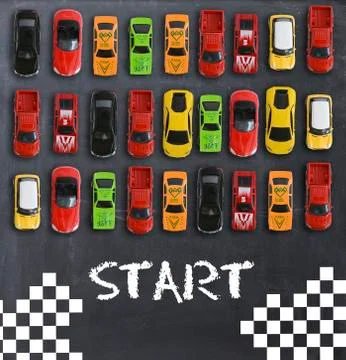 Race or competition concept with multiple toy cars on a blackboard Stock-Fotos