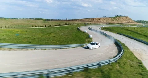Racecar going corner fast drone footage Stock Footage 89416341