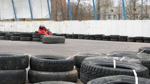 Racers on a go-kart track Stock Footage 93285053