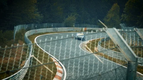 Racetrack surrounded by forest. Looking through fence Video stock 111426801