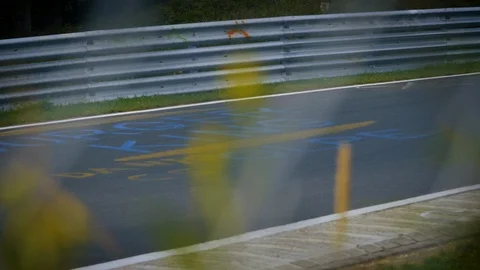 Racetrack surrounded by forest. Looking through fence. Closeups Stock Footage 111427058
