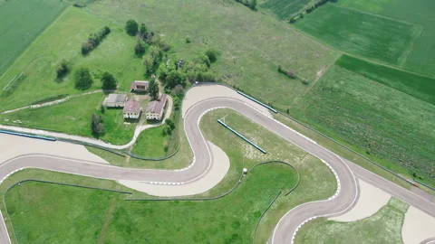 Racetrack of zig zag shape of large autodrome from aerial view shot in sunny day Stock Footage 303060172