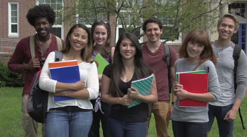Racially-diverse students smile to camera - slow motion. Stock Footage 44117247