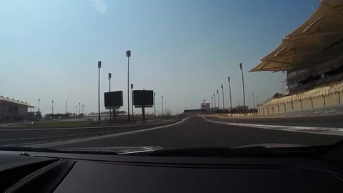 Racing along F1 circuit. First person view FPV from passenger seat. Stock Footage