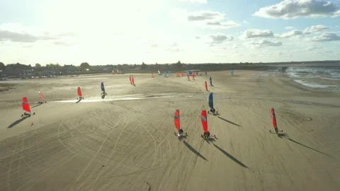 Racing on Blokarts by the ocean Stock Footage 152942206