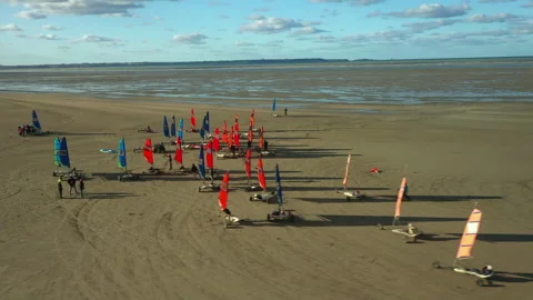Racing on Blokarts by the ocean Stock Footage 152942238