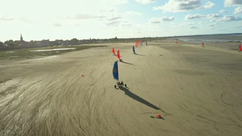 Racing on Blokarts by the ocean Stock Footage 152942290
