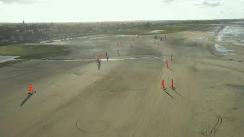 Racing on Blokarts by the ocean Stock Footage 152942416