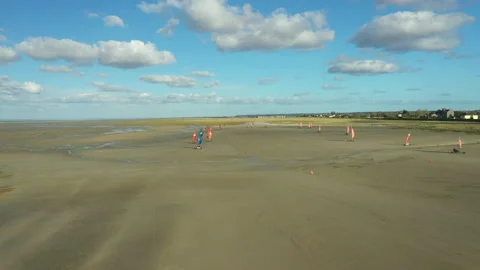 Racing on Blokarts by the ocean Stock Footage 152942613