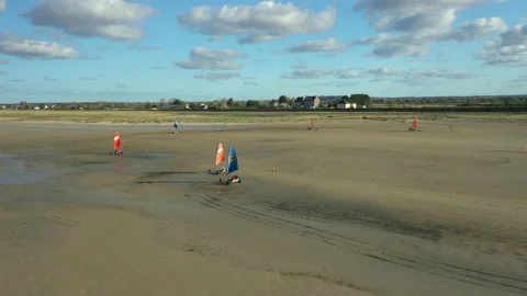 Racing on Blokarts by the ocean Stock Footage 152942737