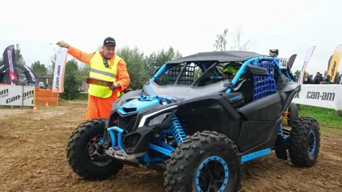 The racing buggy with the pilot is ready to start Stock Footage 189045409