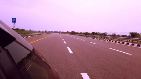 Racing a car on expressway Stock Footage 104657226