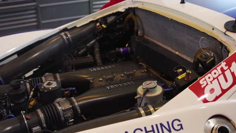 Racing car with Ferrari engine accelerating for testing. Engine Smoking Video stock 134538968