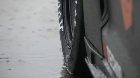Racing car in the rain Stock Footage 52456286