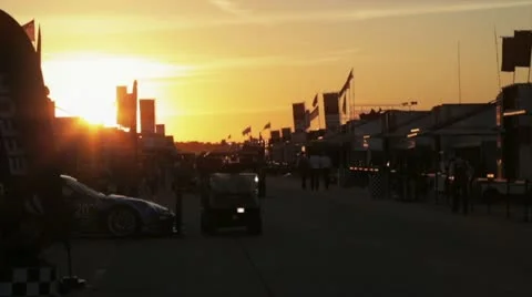 Racing car spots of the teams at sunset Stock Footage 22170507