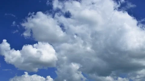 Racing clouds on blue sky Stock Footage 40339573