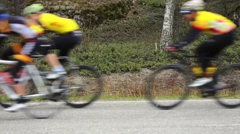 Racing cyclist driving by Vidéo 49508523